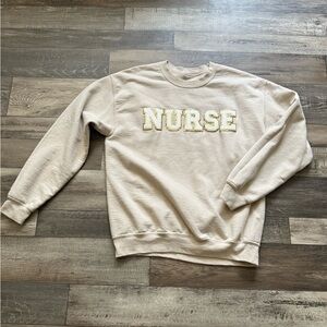 Cream Sweatshirt with Gold 'NURSE' Embroidery